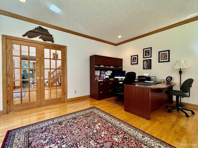 office space featuring ornamental molding, a textured ceiling, and wood finished floors