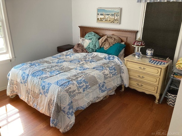 bedroom featuring hardwood / wood-style flooring