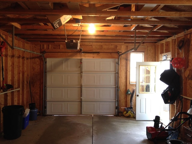 garage featuring a garage door opener