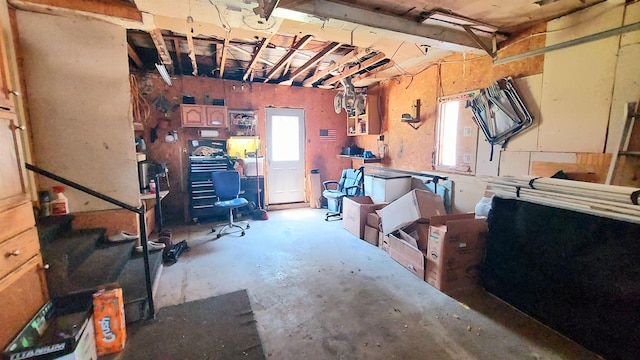 basement with a workshop area