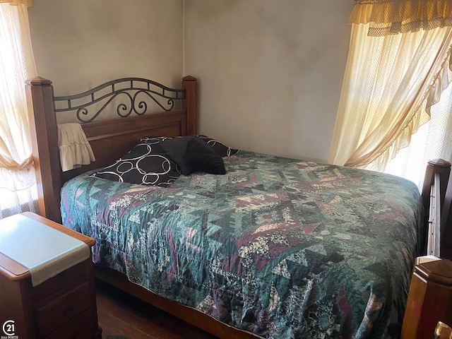 bedroom featuring hardwood / wood-style flooring