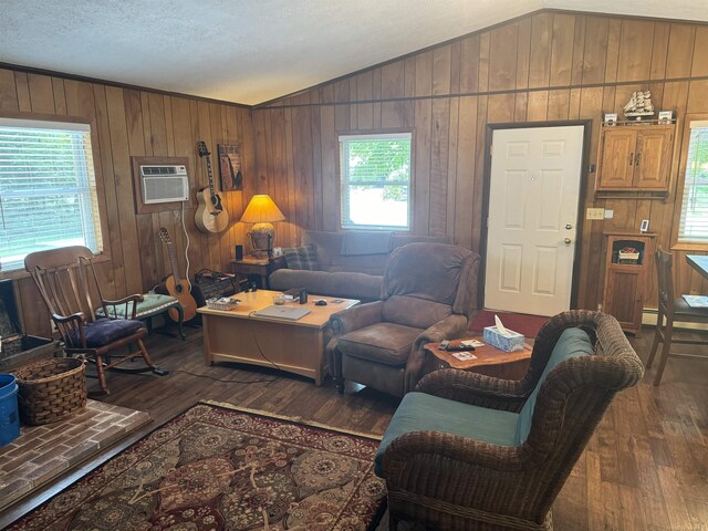 hallway featuring wood walls, baseboard heating, and dark hardwood / wood-style flooring