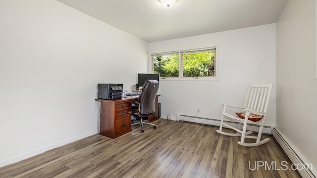 office featuring wood-type flooring and baseboard heating