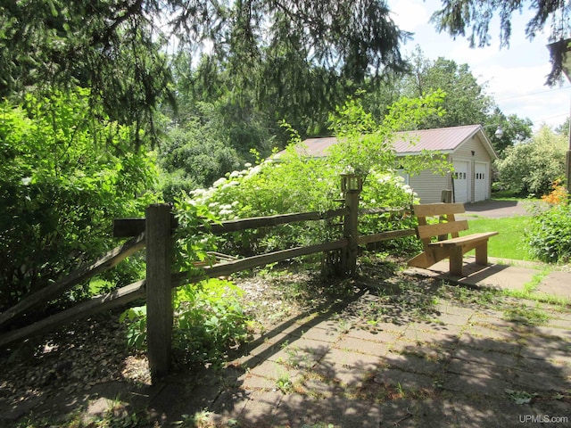 view of yard with a garage