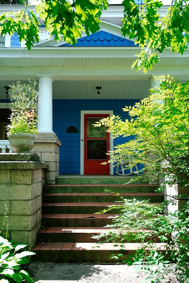 entrance to property with a porch