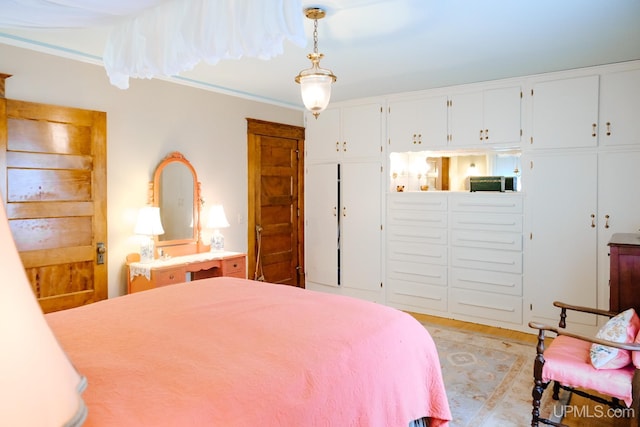 bedroom featuring light hardwood / wood-style flooring