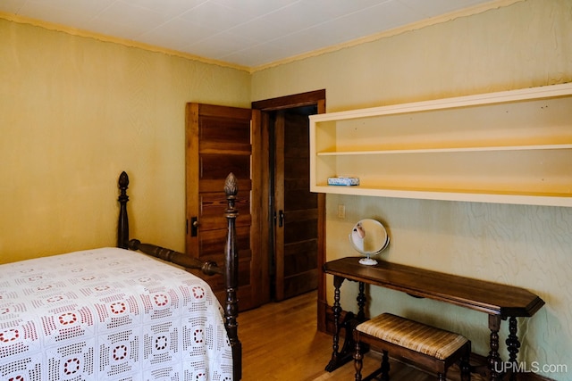 bedroom featuring hardwood / wood-style flooring