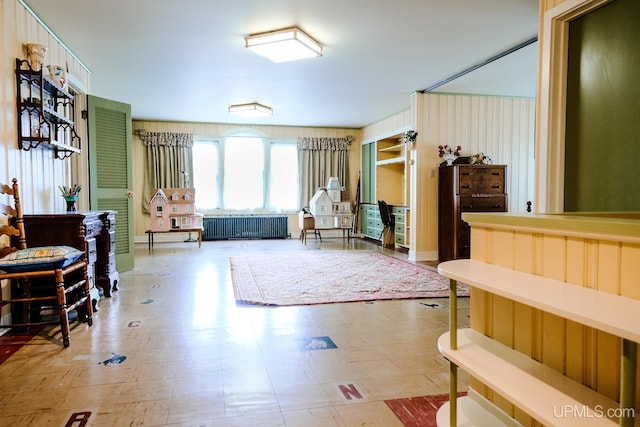 sitting room featuring radiator heating unit