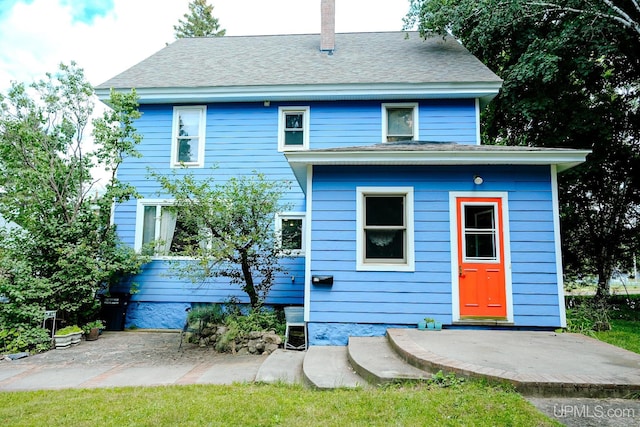 view of front of home featuring a patio