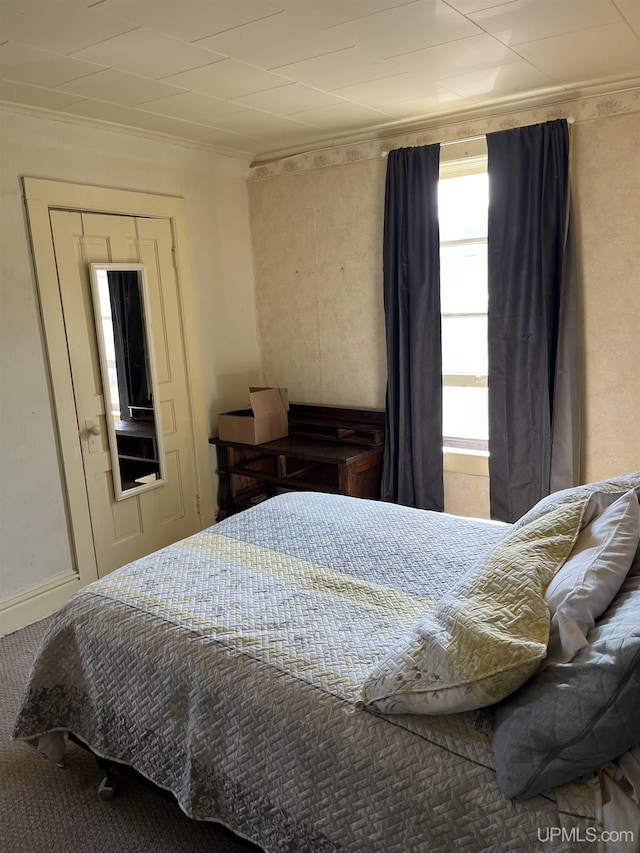 501 E N St, Ishpeming, MI 49849 - bedroom featuring ornamental molding