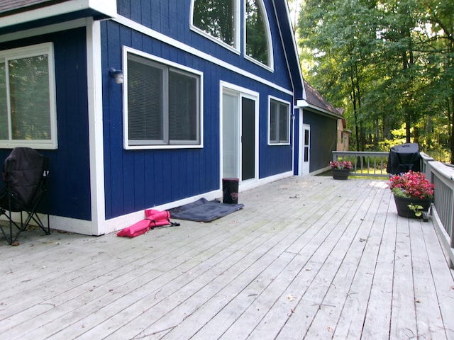 wooden deck with area for grilling