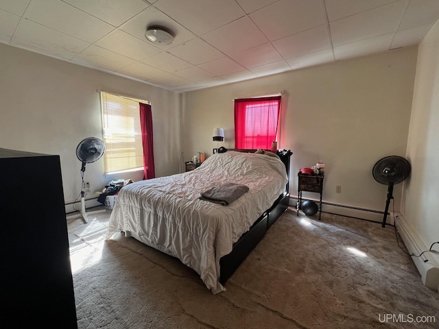 bedroom featuring a baseboard radiator and carpet flooring