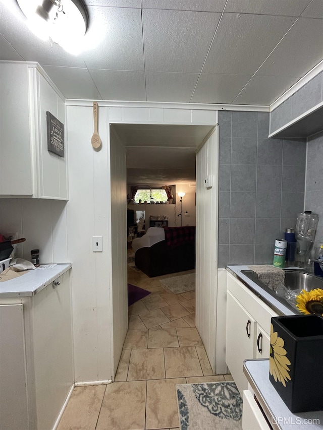 bathroom with tile patterned floors and sink