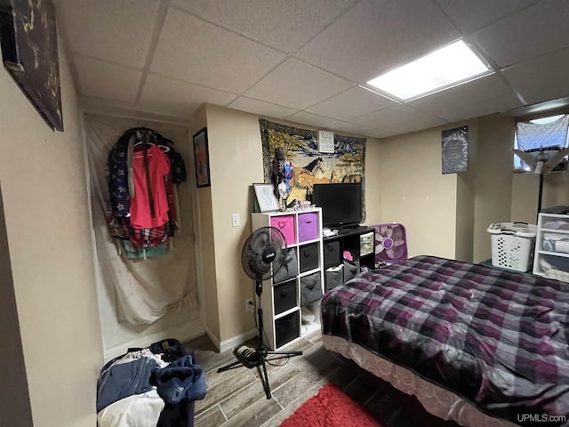 bedroom featuring a paneled ceiling