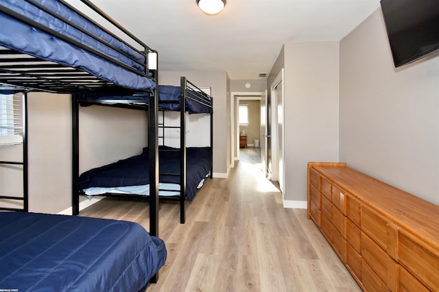 bedroom featuring light wood-type flooring