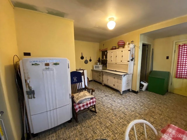 kitchen with white cabinetry