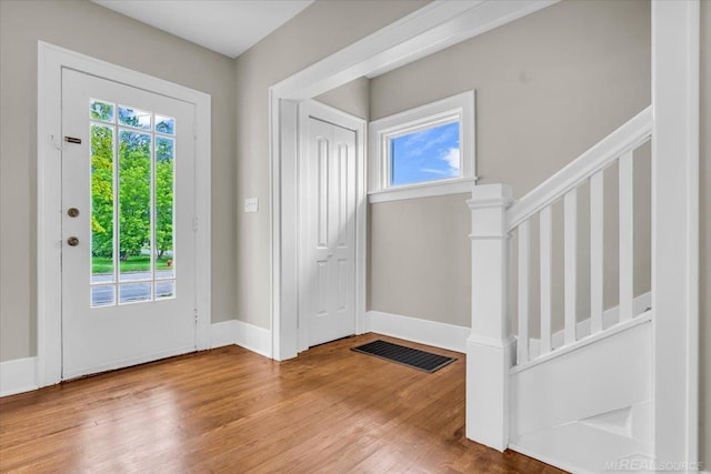 entrance foyer featuring hardwood / wood-style floors