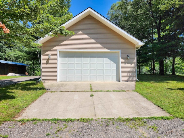 garage with a yard