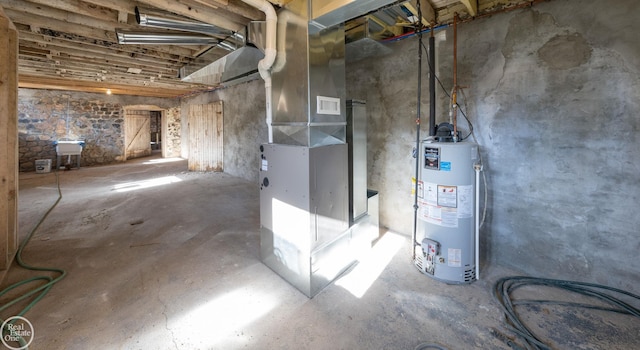 basement featuring water heater