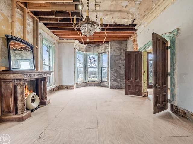 miscellaneous room with a notable chandelier