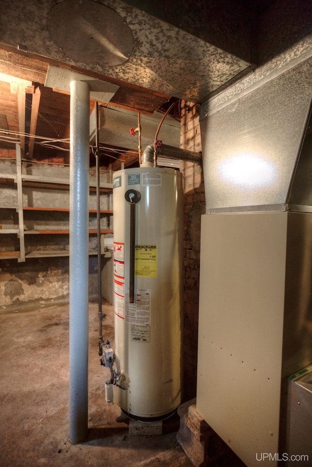 utilities featuring heating unit and gas water heater