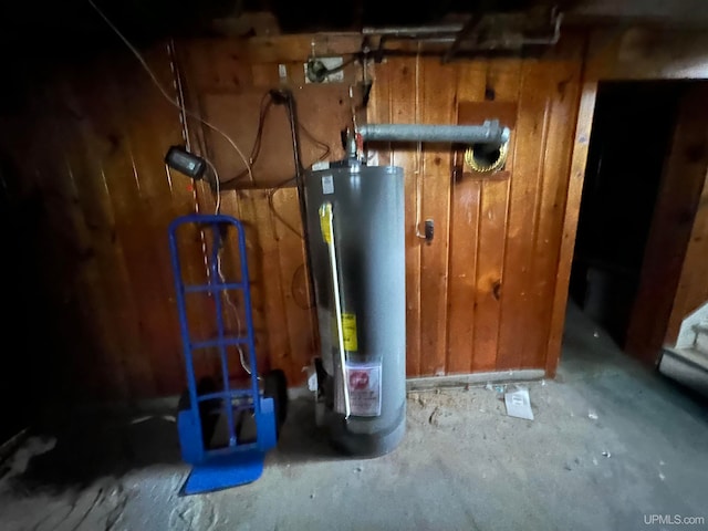 utility room with gas water heater