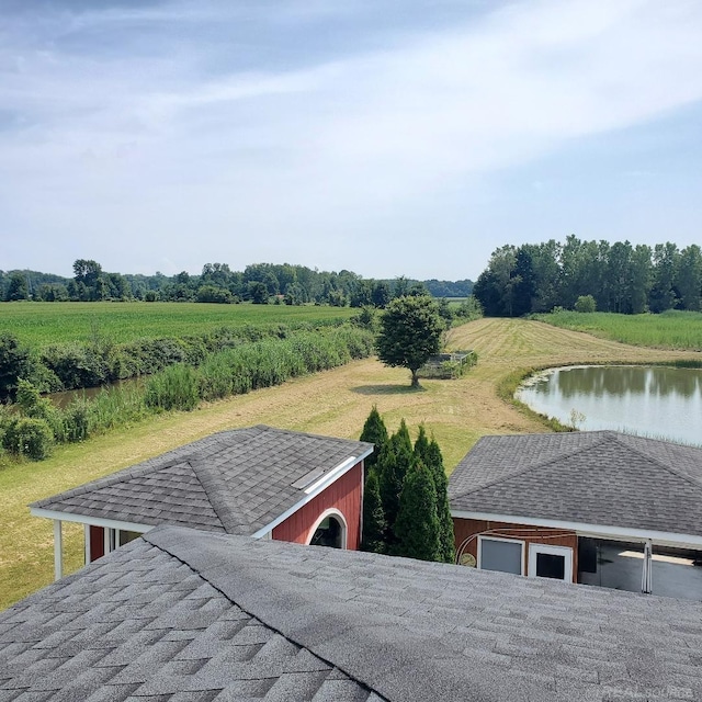 bird's eye view featuring a water view and a rural view