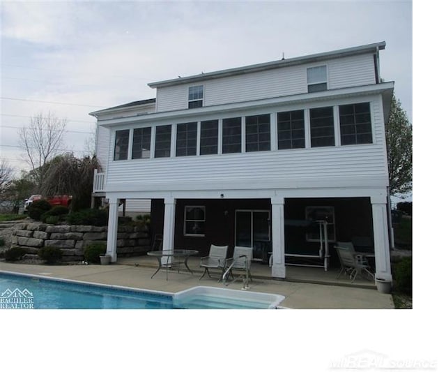 rear view of house with a patio area