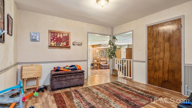 sitting room with light wood-type flooring