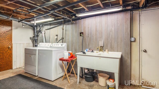 washroom featuring washer and dryer