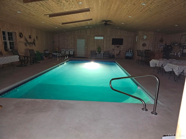 view of pool with a patio and ceiling fan