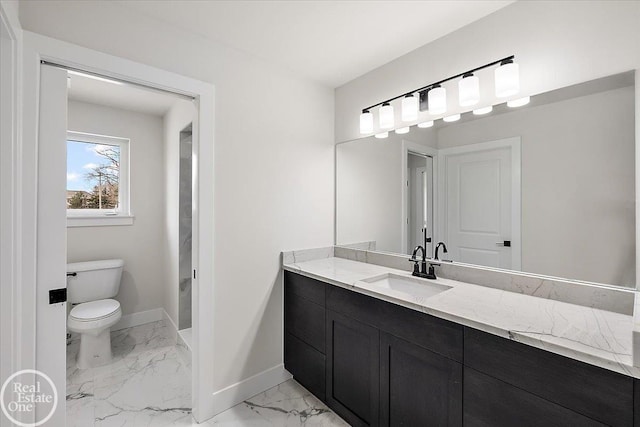 bathroom with marble finish floor, vanity, toilet, and baseboards