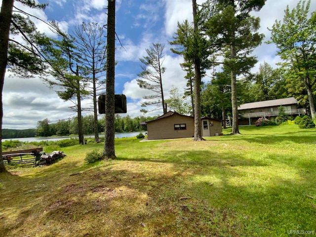 view of yard with a water view