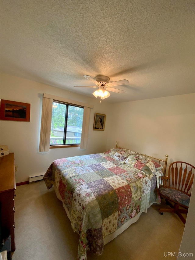 carpeted bedroom featuring ceiling fan, a textured ceiling, and baseboard heating