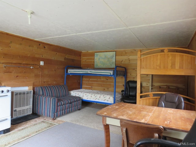 bedroom with wooden walls