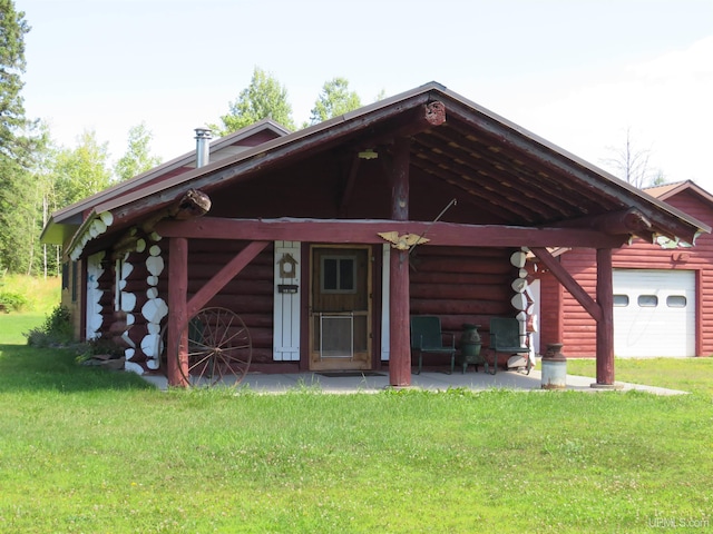 exterior space featuring a front yard and a garage