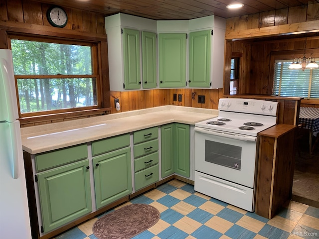 kitchen featuring white appliances, wooden walls, a chandelier, and wooden ceiling