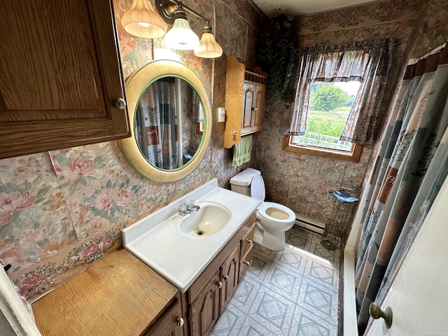 full bathroom featuring vanity, a baseboard radiator, wallpapered walls, curtained shower, and toilet