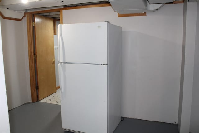 kitchen featuring white fridge and light tile patterned floors