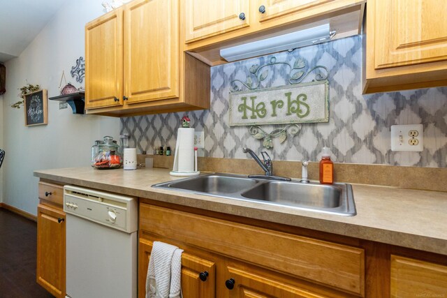 kitchen with sink and white dishwasher