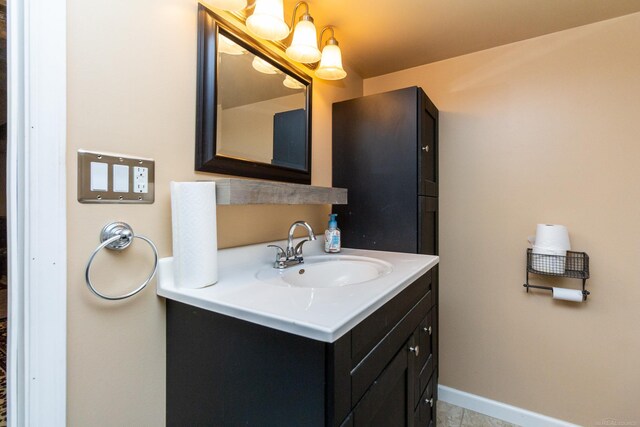 bathroom with vanity and tile patterned flooring