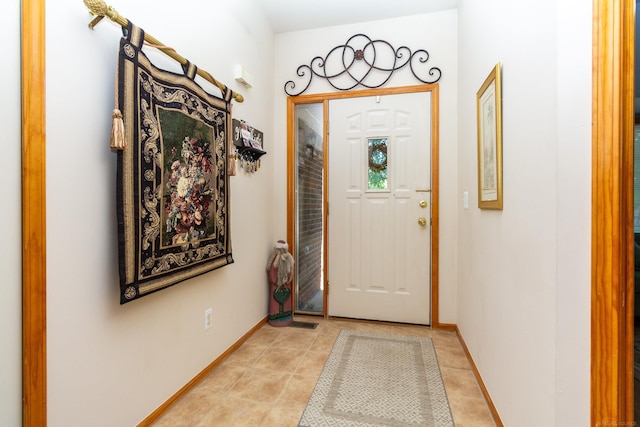 entryway featuring light tile patterned floors