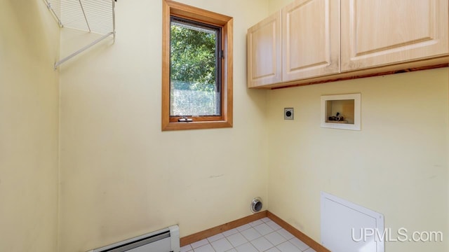 laundry area featuring electric dryer hookup, cabinets, light tile patterned floors, and washer hookup