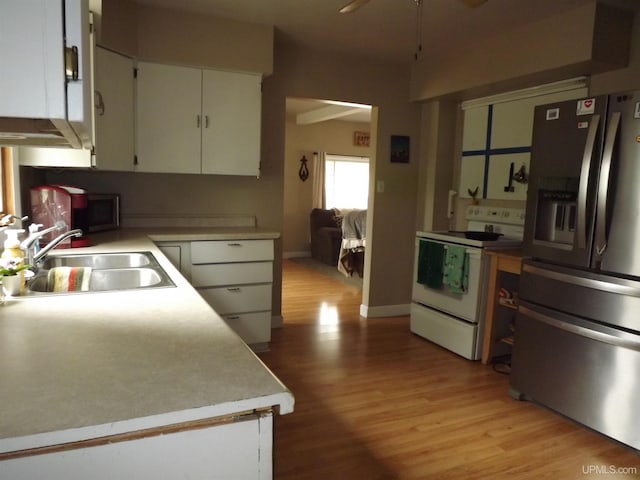 kitchen with white cabinetry, sink, light hardwood / wood-style flooring, stainless steel refrigerator with ice dispenser, and white electric stove