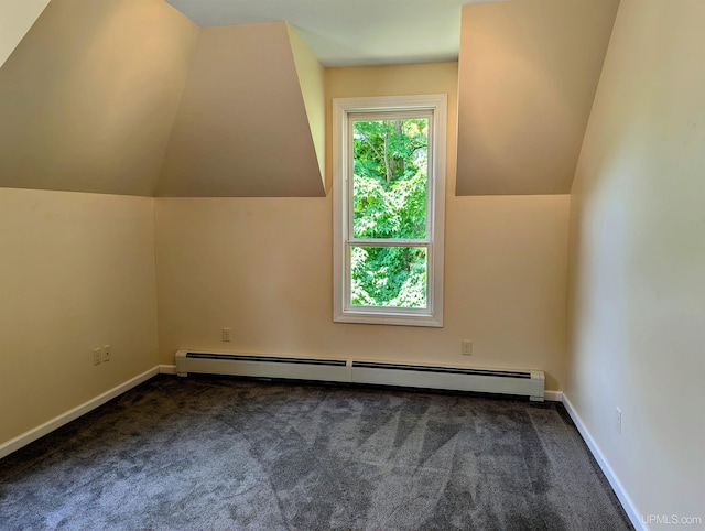 bonus room featuring lofted ceiling, dark colored carpet, and baseboard heating