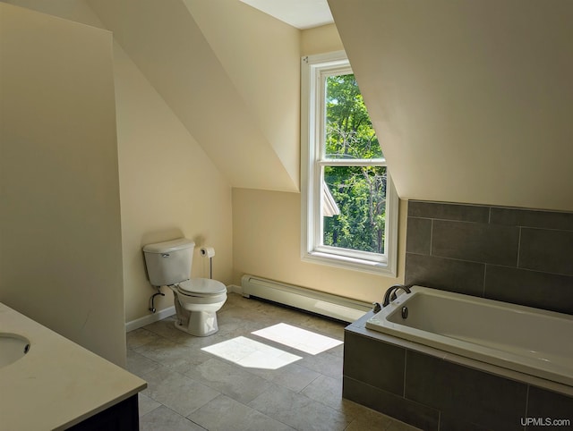 bathroom with baseboard heating, toilet, tile patterned flooring, tiled tub, and vanity