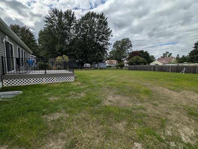 view of yard featuring a deck