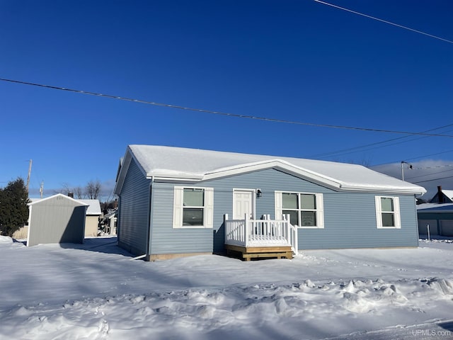 view of front of home with a deck