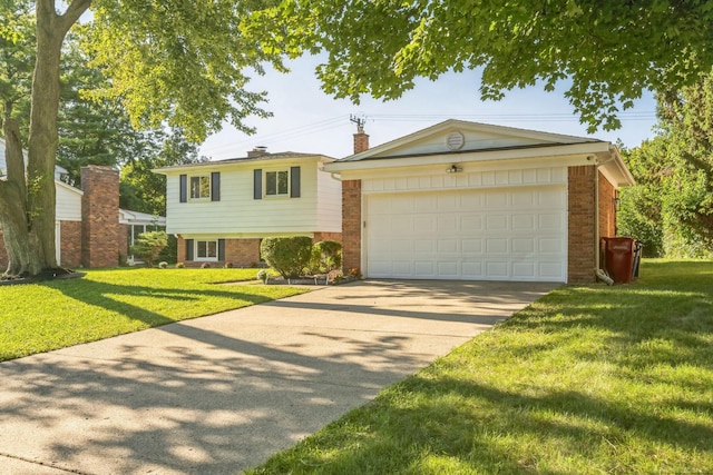 view of front of property with a garage and a front yard