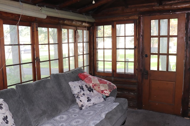 sunroom / solarium with beam ceiling and plenty of natural light